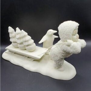 Snowbabies Sledding with Penguin
